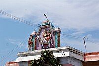 A stucco image indicating the legend of Sundarar worhsiping Shiva Thirukoodalaiyatrur - Narthana Vallabheshwarar (1).jpg