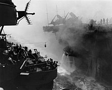 Transfer of wounded from USS Bunker Hill to Wilkes-Barre Transferring casualties from USS Bunker Hill (CV-17) to USS Wilkes-Barre (CL-103), 11 May 1945.jpg