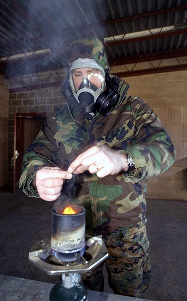 File:US Navy 040110-N-6157F-018 Marine Gysgt. Victor Szalankiewicz, the Marine advisor to Naval Mobile Construction Battalion Two Three (NMCB-23) burns tear gas.jpg