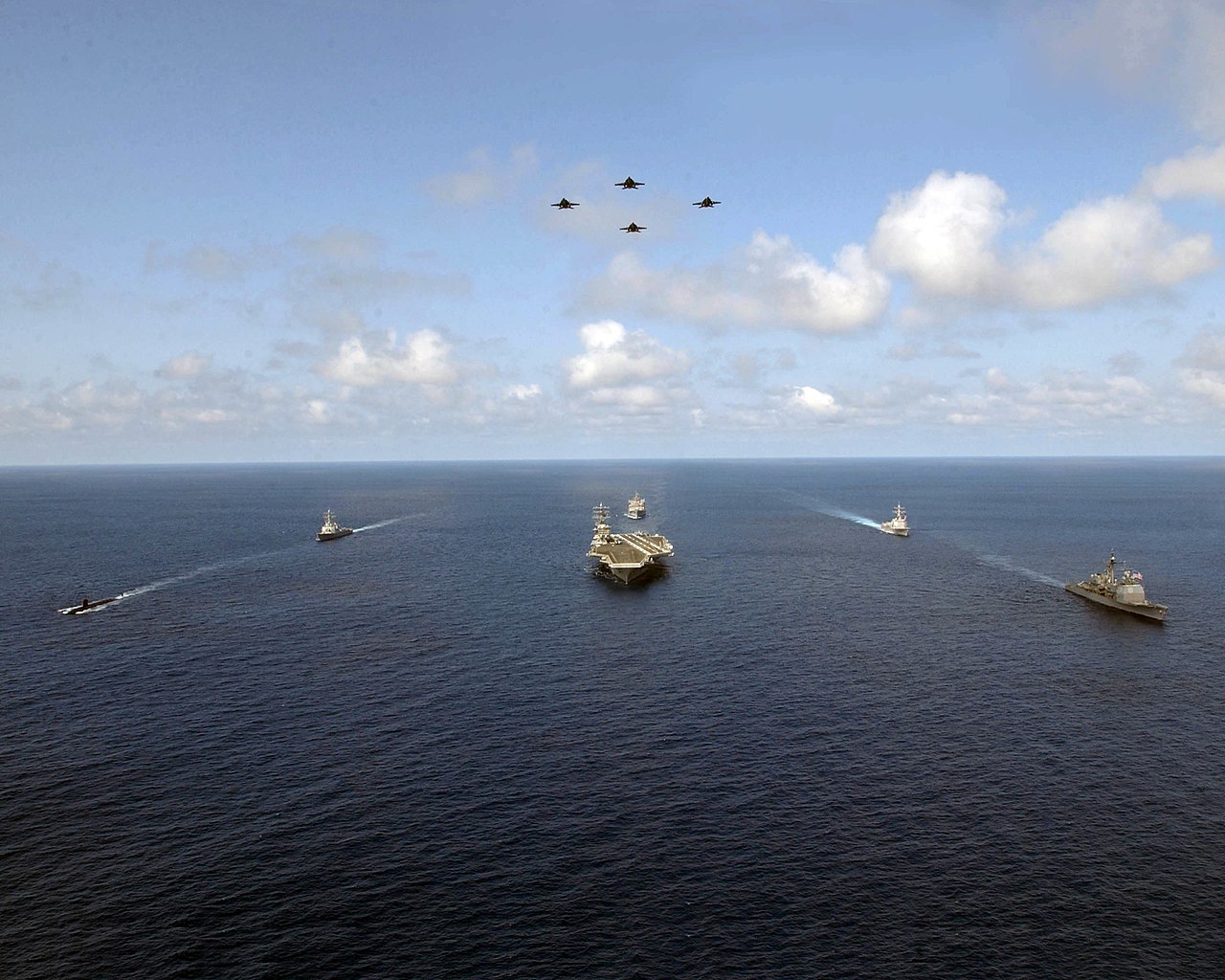 File:US Navy 050314-N-0413R-004 Four F-A-18F Super Hornets fly over USS  Nimitz (CVN 68) and her escorts while underway off the coast of southern  California.jpg - Wikimedia Commons