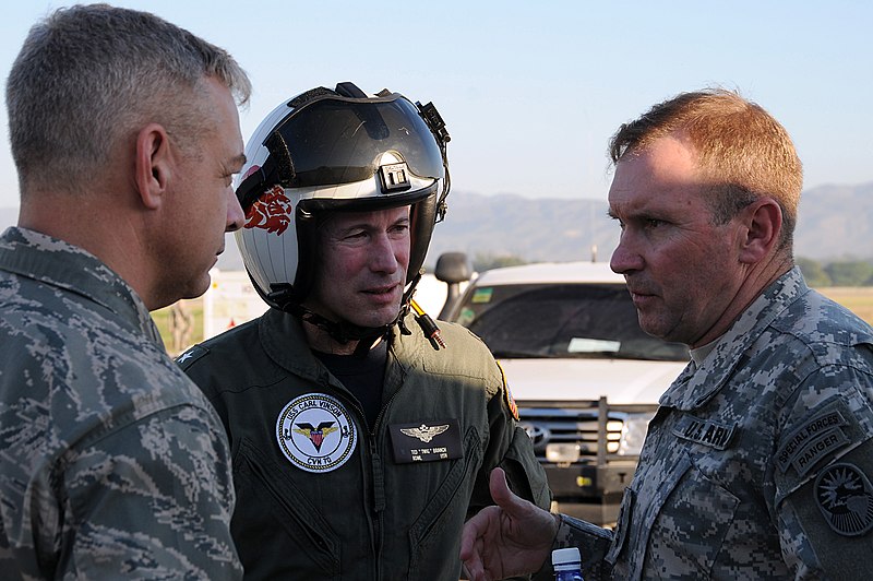 File:US Navy 100115-N-6247V-118 Rear Adm. Ted N. Branch, center, commander, Carrier Strike Group (CSG) 1, speaks with Army Lt. Gen. Keen, right and Air Force Col. Ament, left upon his arrival in Haiti Jan. 15.jpg
