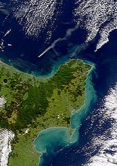 Eruption plume stretching northeastwards from Whakaari / White Island as seen from space, June 2000