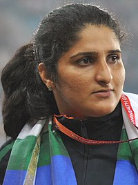 XIX Commonwealth Games-2010 Delhi Pemenang Discus (Perempuan) Krishna Poonia dari India (Emas), Harwant Kaur India (Perak) dan Seema Antil dari India (Perunggu) selama presentasi medali upacara acara (dipotong) - Seema Antil.jpg