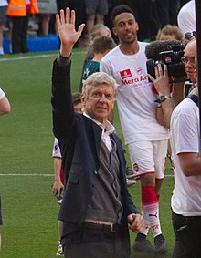 Arsene Wenger was the first manager inducted into the Premier League Hall of Fame, with Manchester United manager Alex Ferguson. 45 Merci Arsene - Lap of Appreciation (27086072017).jpg