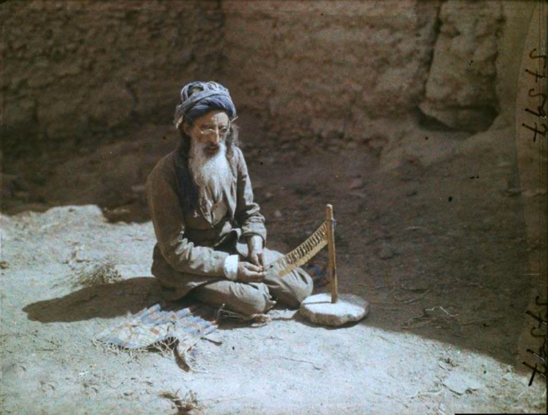 File:A goldsmith at work in a mud-walled courtyard in Kabul, Afghanistan (1928).png