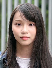Portrait of a young adult Asian female with long hair