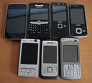 Assorted smartphones. From left to right, top ...