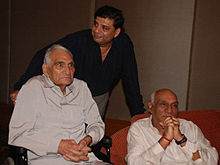 B. R. Chopra (sitting left) and Yash Chopra attending audio release of Naya Daur