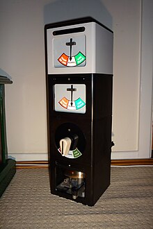 Telegraph block instruments of standard British Railways design. The bell is in the bottom part with the key for sounding the bell in the next signal box. Above that is the switch for indicating whether the section of line is clear (green), there is a train in that section (red) or the normal "line blocked" state (white). Block Instruments-9.JPG