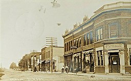 Main Street i Coleman på ett gammalt vykort.