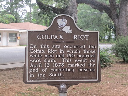 Former historical marker in Colfax. Erected in 1950, the marker was removed in May 2021 due to allegedly biased language (it uses the term "riot" and refers to the incident as "the end of carpetbag misrule in the South").