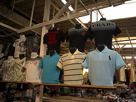 Counterfeit t-shirts at a flea market.