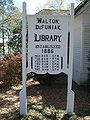 Sign outside the Walton-DeFuniak Library.