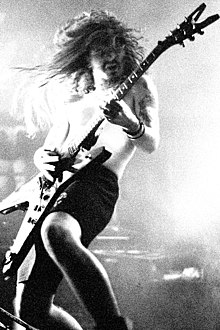 Dimebag Darrell plays guitar with Pantera at The Bayou in 1990.