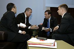 Dmitry Medvedev and Recep Tayyip Erdogan with interpreters in the foreground. Dmitry Medvedev and Recep Tayyip Erdogan.jpg