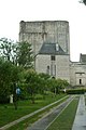 The donjon (background) with its stair tower and a front building