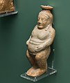 East Greek plastic aryballos - seated naked fat man - Rhodos AM 6488 - 02