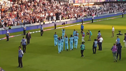 England perform a lap of honour around Lord's after their victory on 14 July 2019.