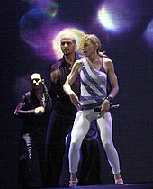 Madonna's vocals in Erotica were singled out for praise by some critics; in the image, the singer is performing a remix version of the song, known as You Thrill Me, on 2006's Confessions Tour.