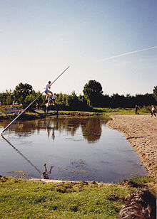 Traditional fierljeppen in the Netherlands, using poles to clear "horizontal distances" over rivers Fierljeppen de natsprong.jpg