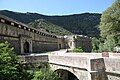 Porta del segle xviii, porta del XII, Baluard del Delfí i, dalt, el Fort Libèria