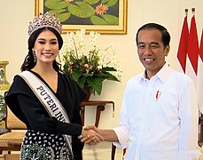 Indonesian beauty queen Frederika Alexis Cull, with President Joko Widodo