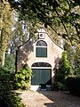 Coach house of Huis te Jaarsveld. This is an image of rijksmonument number 511209