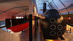 Två vitt skilda generationer av svenska ubåtar i ubåtshallen på Marinmuseum i Karlskrona: HMS Hajen, i tjänst 1905-1922, och HMS Neptun, i tjänst 1980-1998
