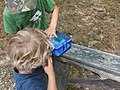 His first Geocache at Twin Lakes State Park (14243200658).jpg