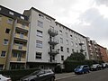 Apartment building in closed development with front garden