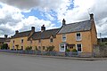 Houses in the high street at Badminton, Gloucestershire.