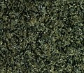 Dalle polie de gabbro-norite, vendue sous l’appellation de « granite noir impala », extraite du CIB. Elle est composée essentiellement de feldspath grisâtre et de pyroxène noir. La carrière se situe au nord de la ville de Rustenburg.