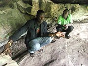 Inside the Tano Rock Shrine, in Tanoboase, Ghana.jpg