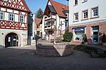 Dreischalenbrunnen (shown in the city arms), old town hall and town hall fountain, main street