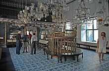 The interior of the Paradesi Synagogue in Cochin. Kochi Jewish Synagogue C.jpg