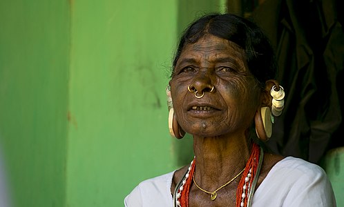 Indigenous Lanjia Sora woman in traditional jewelry in Odisha, India.