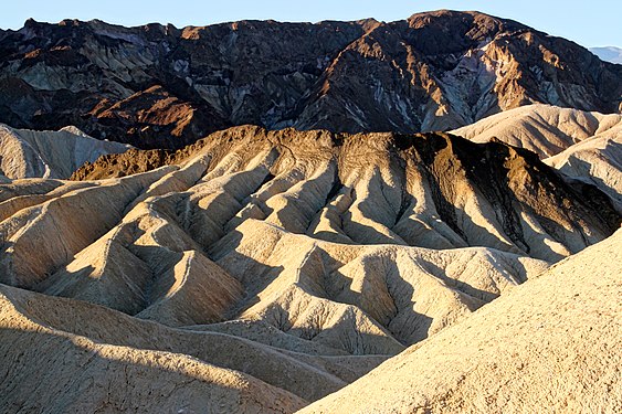 Light of rising sun displaces the shadows in death valley - USA