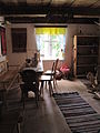 English: Ethnographic Park in Olsztynek - 17a. Interior of a mid 19th century hut with an arcade extension from Chojnik near Ostróda. Polski: MBL Olsztynek - 17a. Wnętrze chałupy z wystawką podcieniową z Chojnika, gm. Morąg., pow. Ostróda.