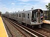 A train made of R143 cars in cars in L service at New Lots Avenue, bound for Manhattan in 2015