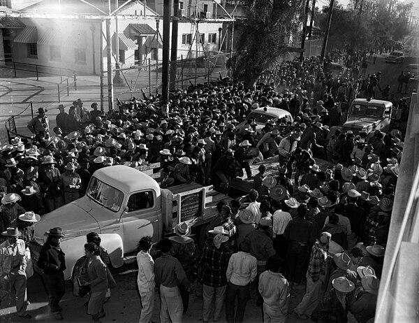 Mexican workers await legal employment in the United States, 1954