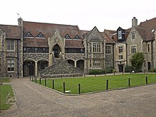 The inner of Mint Yard, with the Parry Block on the centre, built in 1881 Mint Yard Canterbury.jpg