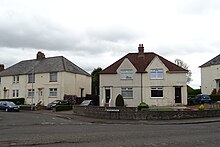 Typical housing in Bonnyton, consisting of four in a block flats and semi-detached houses NS4138 - Houses on Bonnyton Road.jpg