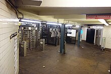 Fare control area on Queens-bound platform Northern Bl IND td (2019-03-15) 01.jpg