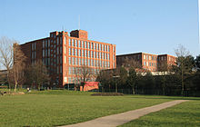 Osborne Mills, Chadderton. No. 1 to the rear was by A H Stott (1873), extended (1891, 1900), No. 2 was by P S Stott (1912) both closed 1968. Osborne Mills, Chadderton 695142-by-Chris-Allen.jpg