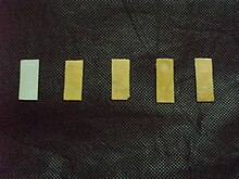 Pristine nylon-6 (white) and nylon-6/LNR blends (yellow) films, prepared via emulsion dispersion technique. PC130029.JPG