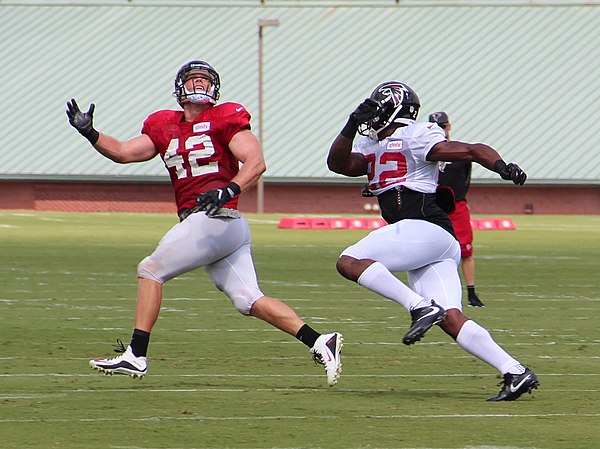 Neal (right) covering Patrick DiMarco at Falcons training camp in 2016