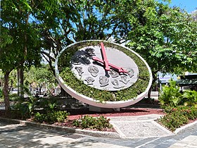 Floral clock with faces of famous past citizens of Caguas