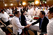 President Rodrigo Duterte (foreground, 3rd from right) presides over a meeting with the NTF-ELCAC at the Malacanan Palace on April 15, 2019 President Rodrigo Roa Duterte presides over a meeting with the National Task Force to End Local Communist Armed Conflict (NTF-ELCAC) at the Malacanan Palace on April 15, 2019 5.jpg