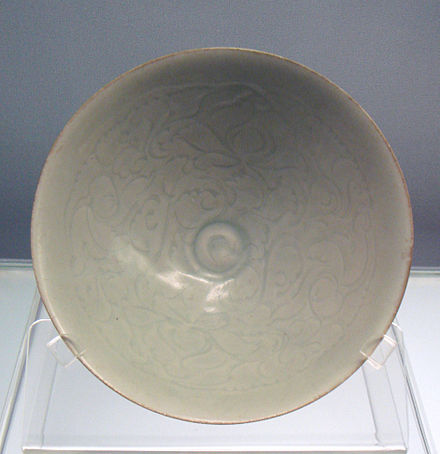 Qingbai ("Blueish-white") glazed bowl with carved peony designs, Jingdezhen, Southern Song, 1127–1279.