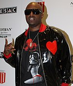 Additional songs, recorded with singer Rico Love, replaced much of the album's original material. Rico Love by Sandra Alphonse.jpg